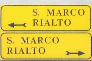 Direction signs in Venice, guided transfer service with Isabella Bariani